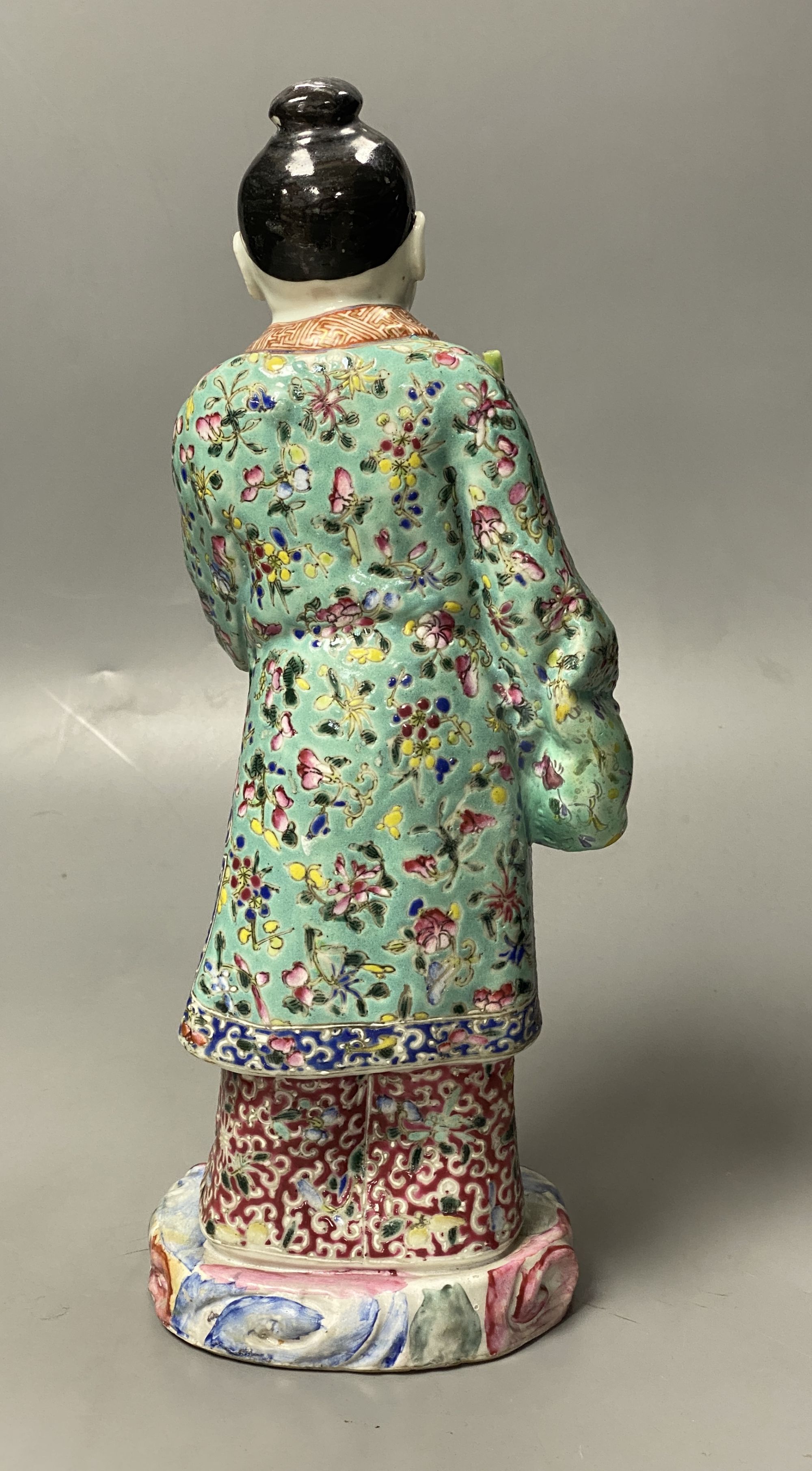 A Chinese famille rose porcelain figure of an immortal, probably Republic period